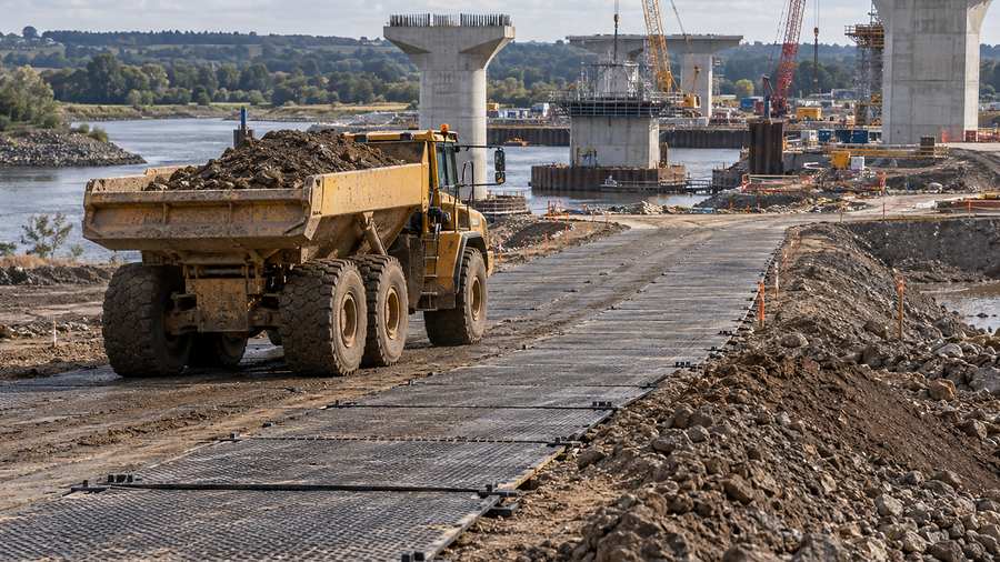 Plankted platform for heavy vehicles turning around at the bridge construction site for the new construction site scene